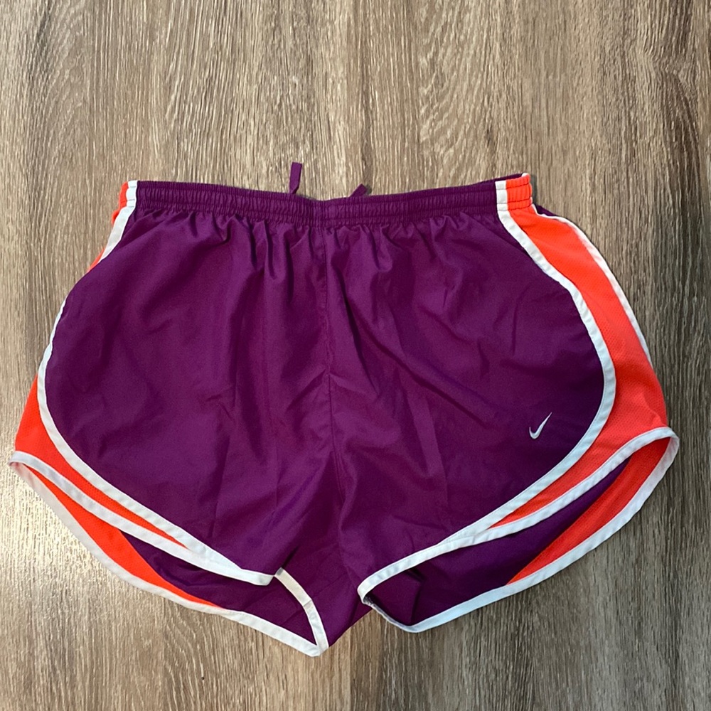 Nike Dri-Fit shorts in purple and pink